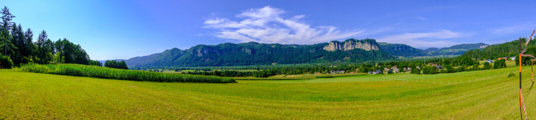 Naklejka na ściany i meble Panoramic view of countryside in Carinthian Alps, Austria