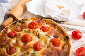 pie with  cheese brie and cherry tomatoes