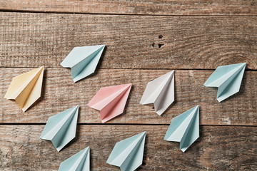 Smm promotion mockup. Marketing strategy. Seo development. Colourful paper airplanes on wooden backdrop, copy space