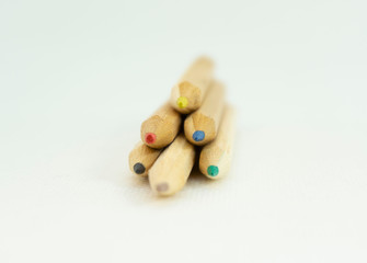 six wood little colored pencils