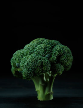 broccoli on black background