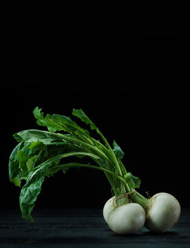 turnip cabbage on black background