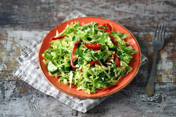 Healthy vitamin salad with fresh cabbage. Spring salad with cabbage and herbs. Healthy diet. Immunity diet.