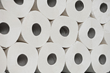 Toilet paper rools stacked on top of each other