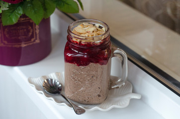 Chia Pudding with Cherry Jam and Almond Petals