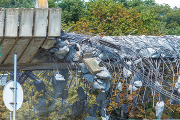 Reinforced concrete road building demolition