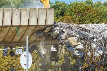 Reinforced concrete road building demolition