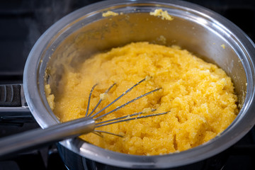 cooking italian polenta in the kitchen