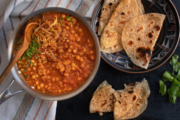 Indian vegan chickpea curry garbanzo curry and chapati flat breads