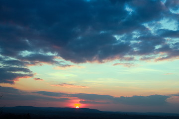Fototapeta na wymiar Sonnenuntergang, Wolken, Farbenspiel am Himmel
