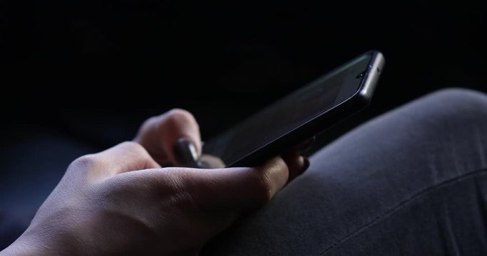 Closeup of Young Woman Hands Typing SMS Scrolling Pictures Phone