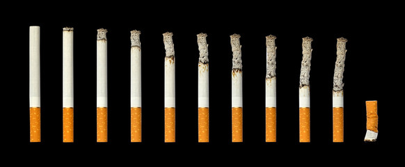 Cigarettes burning and extinguished cigarette butt black isolated background