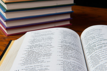 bible with books at end table