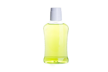 Bottle of green mouthwash isolated on a white background.