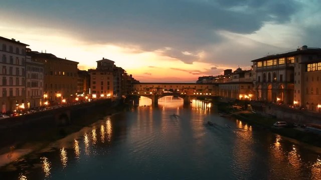 Aerial panoramic view of Ponte Vecchio bridge at sunset Florence Italy