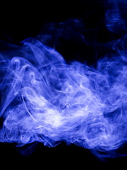 Blue smoke on black background