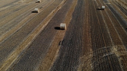 Fototapeta premium Nice aerial view of haystack on the field
