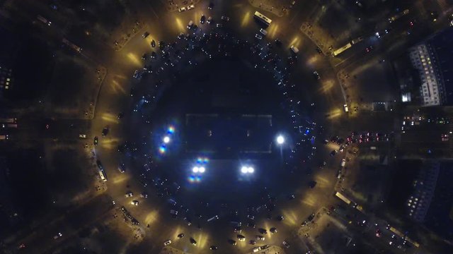 Vertical aerial view of Arc de Triomphe traffic at night Paris France