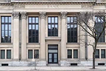 Facade of traditional bank building with corinthian columns