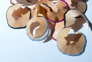 Trash obtained from sharpening crayons, waste of colorful wood from colored pencil to paint,...