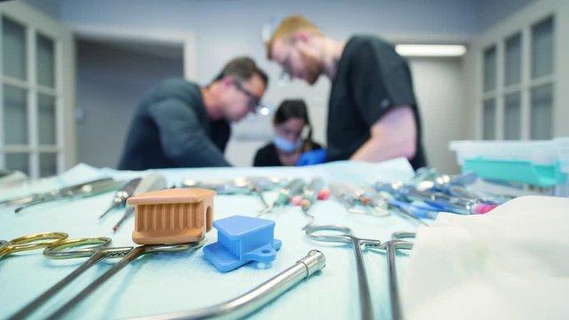 Editorial: HEBER, UT, UNITED STATES, MARCH 27, 2020: Different kind of dental instruments on the dental clinic table.  Close up video of dental instruments.