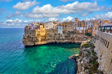 Fototapeta na wymiar View At Ancient City Hanging On The Cliffs of Polignano a Mare, Apulia, Italy