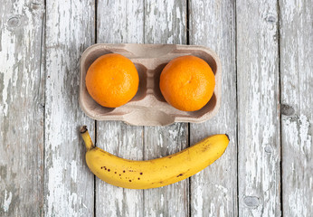 Fruits on the wooden background. Concept of world without plastic.