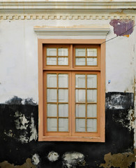 Obraz premium A simple closed window in an old house.