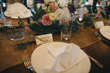  Decorated tables with candles and floral arrangements for celebration