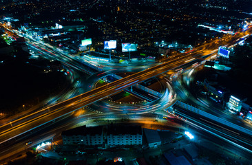 Fototapeta na wymiar Expressway Aerial top view, Road traffic an important infrastructure in Thailand