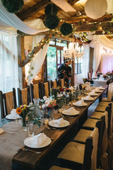  Decorated tables with candles and floral arrangements for celebration