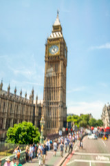 Fototapeta na wymiar Blurred view of tourists enjoying Westminster Bridge in summer