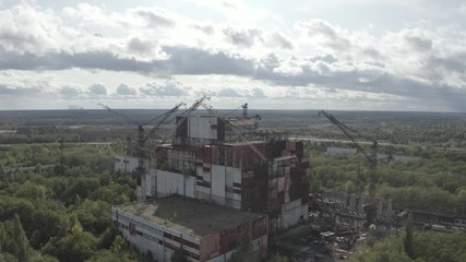 KP-640 crane. They load the reactors in the power units. Rusty tap. Near the city of Pripyat. Video from the drone. Unfinished 5th power unit of the Chernobyl nuclear power plant. Rare footage. Destru