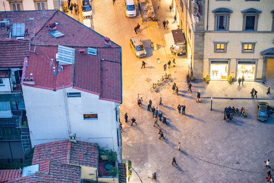 Fototapeta Aerial view of Florence at night, Tuscany, Italy. City streets with tourists