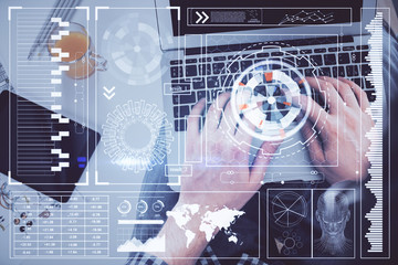 Multi exposure of man's hands typing over computer keyboard and data theme hologram drawing. Top...