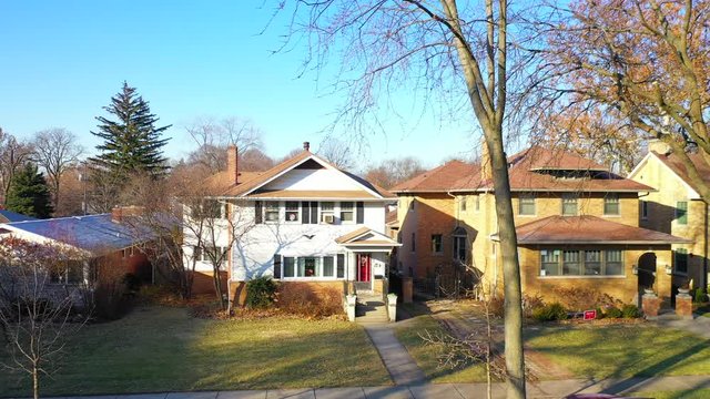 Pan Right View Of Beautiful Homes In A Suburban Midwest Neighborhood