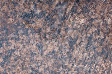 Closeup of grey granite texture background.
