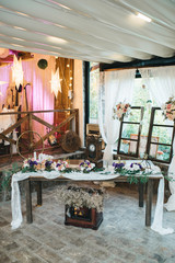  Decorated tables with candles and floral arrangements for celebration