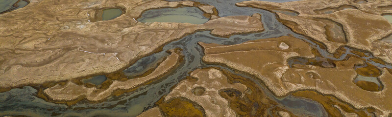 Abstract aerial patterns near the Chatyr-Kul lake in Kyrgyzstan.