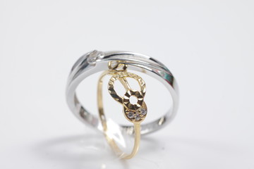 Macro shot of gold ring jewelry on an isolated background