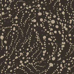 Vector seamless texture of brown color from blots or circles on a brown background. Pattern for printing on fabric or wrapping paper. Simple ornament in grunge style.