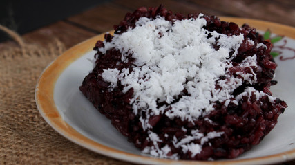 Black sticky rice or Ketan Hitam (Indonesian Name) with grated coconut, very delicious and sweet