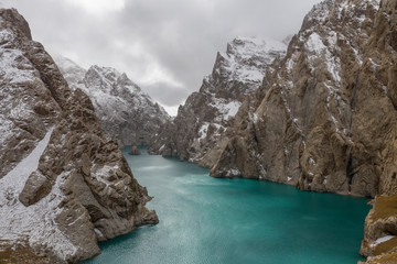 Obraz premium Aerial landcape of the first snow fall at Kol Suu lake.
