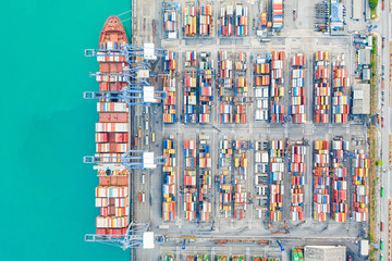 Fototapeta na wymiar Container ship, Business logistic import-export transport international and transportation of containers in port , Shipping container buildings, Aerial at night view of Shipping container worldwide