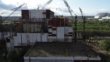 KP-640 crane. They load the reactors in the power units. Rusty tap. Near the city of Pripyat. Video from the drone. Unfinished 5th power unit of the Chernobyl nuclear power plant. Rare footage. Destru