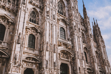 Fototapeta premium Piazza Del Duomo, Milano, Italy - a view from Milano Cathedral over beautiful sunset and place full of tourists