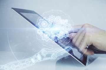 Multi exposure of man's hand holding and using a digital device and data theme drawing. Innovation concept.