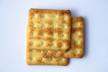 Close up healthy wheat cracker on white background. Cracker biscuit