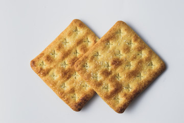 Close up healthy wheat cracker on white background. Cracker biscuit
