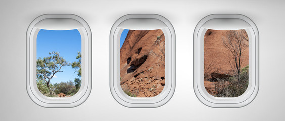 Australian outback desert as seen through airplane windows. Holiday and travel concept